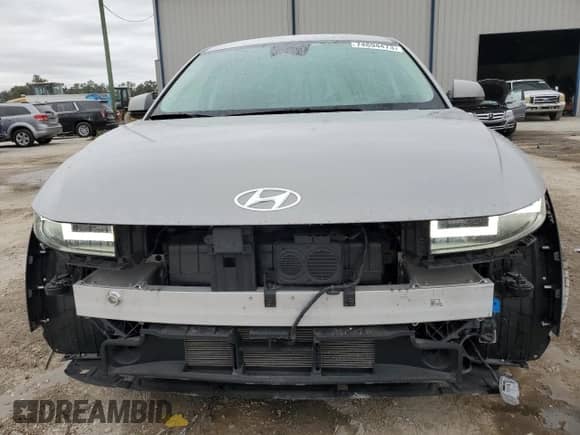 2022 Hyundai Ioniq 5 SE z VIN KM8KM4AE6NU073142, wystawiony jako Copart lot #74694473 z przebiegiem 28 623 mil mil oraz . Historia ofert i sprzedaży dostępna na DreamBid. Obrazek 5.