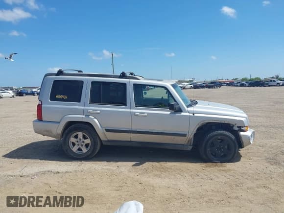 ✅ 2007 Jeep Commander Sport • VIN: 1J8HG48K87C598061 • Лот: 42809400. Опубликован ранее на IAAI с пробегом 200 961 миль. Бесплатный доступ к архиву аукционных продаж из США и подробный отчёт об истории автомобиля на DreamBid. Изображение 14.