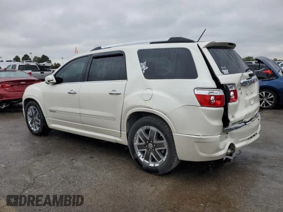 ✅ 2012 GMC Acadia Denali • VIN: 1GKKVTED1CJ384803 • Lot: 90080565. Listed on Copart with 101,735 mi. Free auction sales archive from the USA and detailed vehicle history report at DreamBid. Image 2.