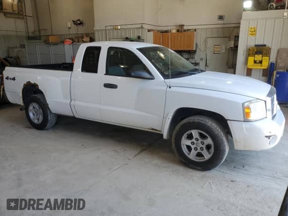 2006 Dodge Dakota SLT с VIN 1D7HW42K96S579208, выставлен на аукционе Copart как лот 71699414 с пробегом 178 506 миль миль и Чистый • Clean title. История ставок и продаж доступна на DreamBid. Изображение 4.