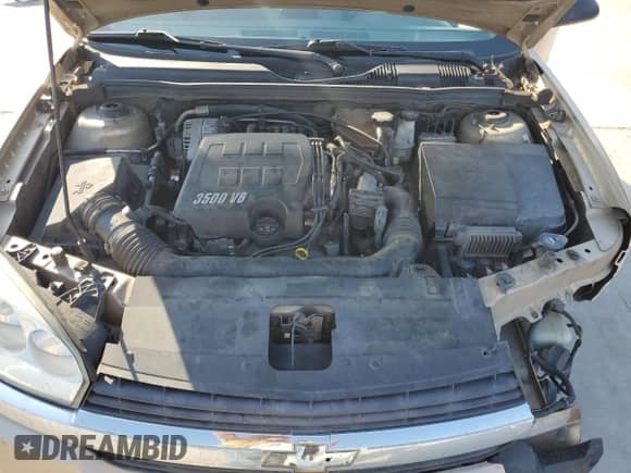 2005 Chevrolet Malibu LS z VIN 1G1ZT54805F285601, wystawiony jako Copart lot #75038064 z przebiegiem 463 039 mil mil oraz Szkoda całkowita • Salvage title. Historia ofert i sprzedaży dostępna na DreamBid. Obrazek 11.