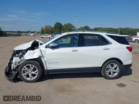 ✅ 2018 Chevrolet Equinox Premier • VIN: 2GNAXMEVXJ6260224 • Lot: 43185295. Listed on IAAI with 56,396 mi. Free auction sales archive from the USA and detailed vehicle history report at DreamBid. Image 14.