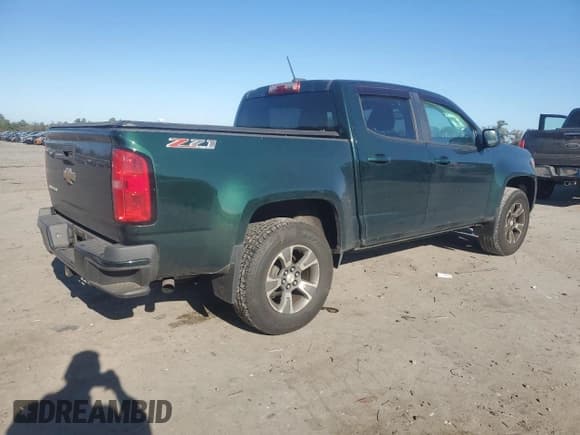 ✅ 2015 Chevrolet Colorado 4WD Z71 • VIN: 1GCGTCE31F1130897 • Лот: 82410375. Опубликован ранее на Copart с пробегом 207 479 миль. Бесплатный доступ к архиву аукционных продаж из США и подробный отчёт об истории автомобиля на DreamBid. Изображение 3.