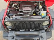 ✅ 2015 Jeep Wrangler Unlimited Sport • VIN: 1C4BJWDG3FL673436 • Lot: 90598515. Listed on Copart with 98,028 mi. Free auction sales archive from the USA and detailed vehicle history report at DreamBid. Image 12.