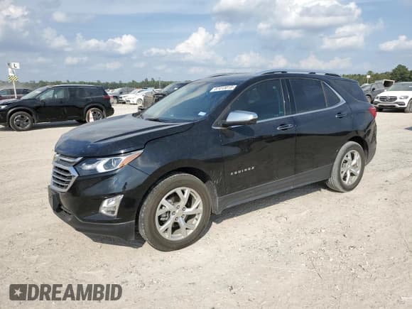 ✅ 2020 Chevrolet Equinox Premier • VIN: 2GNAXNEV7L6275482 • Lot: 87413015. Listed on Copart with 93,079 mi. Free auction sales archive from the USA and detailed vehicle history report at DreamBid. Image 1.