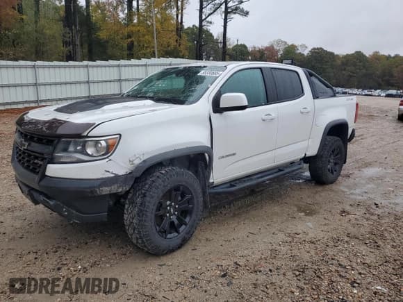 ✅ 2020 Chevrolet Colorado 4WD ZR2 • VIN: 1GCGTEEN7L1230138 • Лот: 85330685. Опубликован ранее на Copart с пробегом 55 158 миль. Бесплатный доступ к архиву аукционных продаж из США и подробный отчёт об истории автомобиля на DreamBid. Изображение 1.