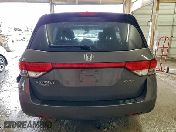 ✅ 2015 Honda Odyssey Touring Elite • VIN: 5FNRL5H98FB103594 • Lot: 94152155. Listed on Copart with 176,146 mi. Free auction sales archive from the USA and detailed vehicle history report at DreamBid. Image 6.