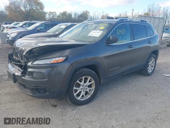 ✅ 2015 Jeep Cherokee Latitude • VIN: 1C4PJMCS6FW528292 • Lot: 43561483. Listed on IAAI with 136,416 mi. Free auction sales archive from the USA and detailed vehicle history report at DreamBid. Image 17.