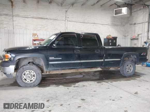 ✅ 2002 GMC Sierra 2500HD SLE • VIN: 1GTHK23152F167693 • Lot: 43241499. Listed on IAAI with Not provided. Free auction sales archive from the USA and detailed vehicle history report at DreamBid. Image 13.