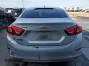 ✅ 2018 Chevrolet Cruze LT • VIN: 1G1BE5SM0J7164843 • Lot: 59765783. Listed on Copart with 65,834 mi. Free auction sales archive from the USA and detailed vehicle history report at DreamBid. Image 6.