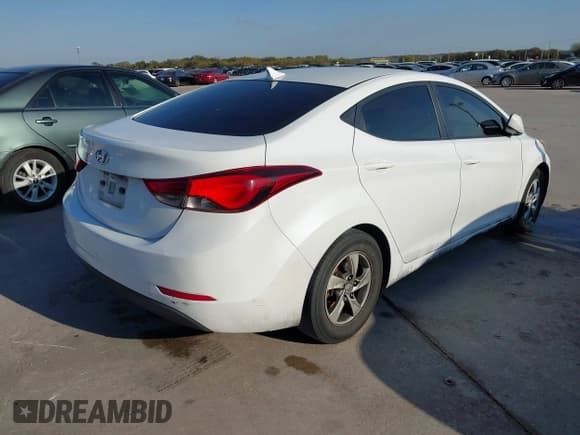 ✅ 2015 Hyundai Elantra SE • VIN: 5NPDH4AE1FH577661 • Lot: 43659649. Listed on IAAI with 199,883 mi. Free auction sales archive from the USA and detailed vehicle history report at DreamBid. Image 4.