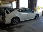 ✅ 2004 Pontiac Grand Prix GT2 • VIN: 2G2WS522741119985 • Lot: 86893245. Listed on Copart with 216,080 mi. Free auction sales archive from the USA and detailed vehicle history report at DreamBid. Image 3.