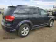2011 Dodge Journey SXT с VIN 3D4PG5FG7BT511287, выставлен на аукционе Copart как лот 84292705 с пробегом 155 732 миль миль и Списание • Salvage title. История ставок и продаж доступна на DreamBid. Изображение 3.