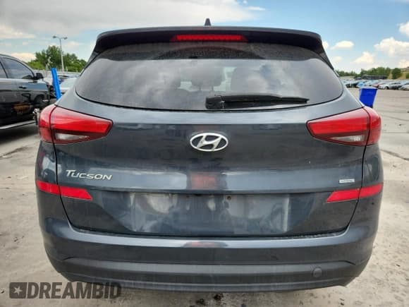 ✅ 2019 Hyundai Tucson SE • VIN: KM8J2CA41KU956337 • Лот: 69233095. Опубликован ранее на Copart с пробегом 152 521 миль. Бесплатный доступ к архиву аукционных продаж из США и подробный отчёт об истории автомобиля на DreamBid. Изображение 6.