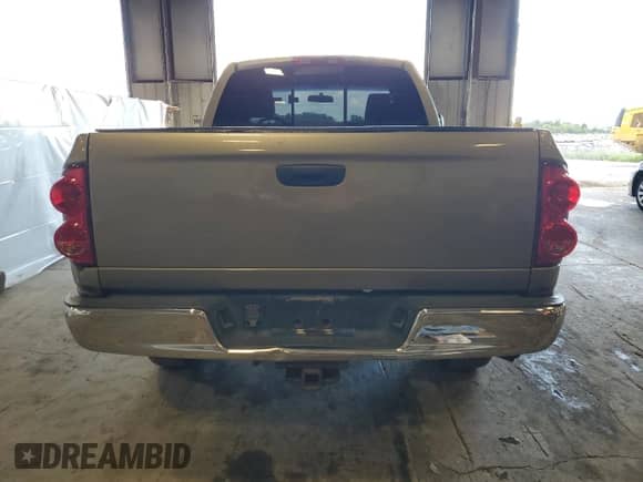 2007 Dodge 1500 SLT with VIN 1D7HU16287J538350, listed as a Copart auction lot 70374565 with 176,813 mi miles and Salvage title. Bid and sale history available at DreamBid. Image 6.