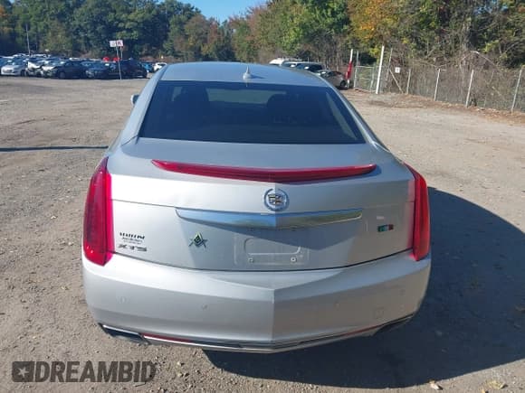 ✅ 2013 Cadillac XTS Luxury • VIN: 2G61P5S3XD9220569 • Lot: 43407862. Listed on IAAI with 121,728 mi. Free auction sales archive from the USA and detailed vehicle history report at DreamBid. Image 16.