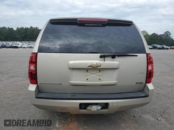 2007 Chevrolet Suburban LT z VIN 1GNFC16027J289845, wystawiony jako Copart lot #81099795 z przebiegiem 137 667 mil mil oraz Szkoda całkowita • Salvage title. Historia ofert i sprzedaży dostępna na DreamBid. Obrazek 6.