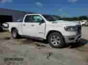 2020 Ram 1500 Laramie with VIN 1C6RREDT3LN262057, listed as a Copart auction lot 69599525 with 124,172 mi miles and Salvage title. Bid and sale history available at DreamBid. Image 4.