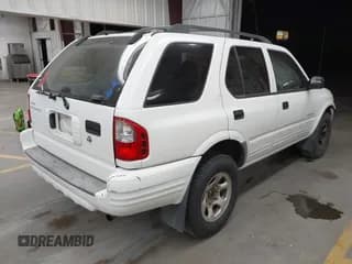 ✅ 2004 Isuzu Rodeo S • VIN: 4S2CK58W244301482 • Lot: 43614335. Wystawiony na IAAI z przebiegiem 163 277 mil. Bezpłatny archiwum sprzedaży aukcyjnych z USA i szczegółowy raport historii pojazdu na DreamBid. Zdjęcie 4.