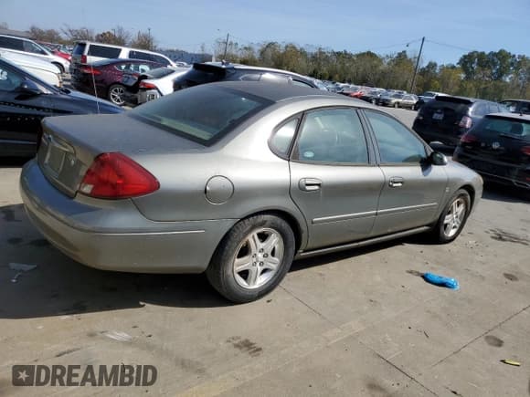 ✅ 2002 Ford Taurus SEL Deluxe • VIN: 1FAHP56S42A212083 • Lot: 77349104. Listed on Copart with 153,303 mi. Free auction sales archive from the USA and detailed vehicle history report at DreamBid. Image 3.