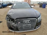 ✅ 2014 Audi S8 • VIN: WAUD2AFDXEN005340 • Lot: 77447534. Listed on Copart with 87,222 mi. Free auction sales archive from the USA and detailed vehicle history report at DreamBid. Image 5.