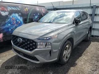 ✅ 2021 Hyundai Santa Fe SE • VIN: 5NMS14AJ5MH338424 • Lot: 49320503. Wystawiony na Copart z przebiegiem 21 930 mil. Bezpłatny archiwum sprzedaży aukcyjnych z USA i szczegółowy raport historii pojazdu na DreamBid. Zdjęcie 1.