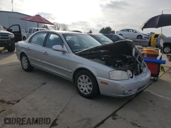 ✅ 2006 Kia Optima LX • VIN: KNAGD126565468244 • Лот: 85373304. Опубликован ранее на Copart с пробегом 118 397 миль. Бесплатный доступ к архиву аукционных продаж из США и подробный отчёт об истории автомобиля на DreamBid. Изображение 4.