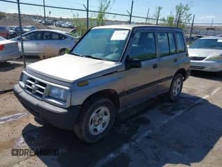✅ 1998 Chevrolet Tracker • VIN: 2CNBJ1369W6913198 • Лот: 42149796. Опубликован ранее на IAAI с пробегом 97 696 миль. Бесплатный доступ к архиву аукционных продаж из США и подробный отчёт об истории автомобиля на DreamBid. Изображение 2.