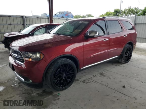 ✅ 2013 Dodge Durango Citadel • VIN: 1C4SDHET0DC667833 • Lot: 71525725. Listed on Copart with 171,478 mi. Free auction sales archive from the USA and detailed vehicle history report at DreamBid. Image 1.
