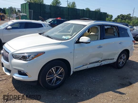 ✅ 2020 Infiniti QX60 Signature Edition • VIN: 5N1DL0MM2LC531608 • Lot: 40247204. Listed on IAAI with 67,655 mi. Free auction sales archive from the USA and detailed vehicle history report at DreamBid. Image 14.