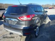✅ 2015 Ford Escape Titanium • VIN: 1FMCU0J94FUB71961 • Lot: 43807507. Wystawiony na IAAI z przebiegiem 67 944 mil. Bezpłatny archiwum sprzedaży aukcyjnych z USA i szczegółowy raport historii pojazdu na DreamBid. Zdjęcie 4.