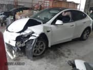 ✅ 2023 Tesla Model Y Long Range • VIN: 7SAYGAEEXPF789037 • Lot: 41551605. Listed on IAAI with 8,630 mi. Free auction sales archive from the USA and detailed vehicle history report at DreamBid. Image 17.