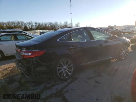 2013 Hyundai Azera z VIN KMHFH4JG4DA318365, wystawiony jako Copart lot #88687635 z przebiegiem 116 632 mil mil oraz Szkoda całkowita • Salvage title. Historia ofert i sprzedaży dostępna na DreamBid. Obrazek 3.