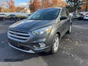 ✅ 2017 Ford Escape SE • VIN: 1FMCU9GD0HUD02497 • Lot: 93264155. Listed on Copart with 124,678 mi. Free auction sales archive from the USA and detailed vehicle history report at DreamBid. Image 1.