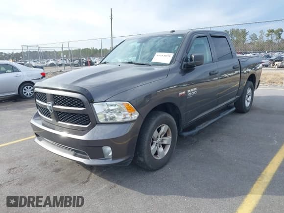 ✅ 2021 Ram 1500 Tradesman • VIN: 3C6RR6KT1MG506291 • Lot: 41453879. Listed on IAAI with 51,449 mi. Free auction sales archive from the USA and detailed vehicle history report at DreamBid. Image 17.