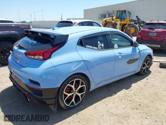 2019 Hyundai Veloster N z VIN KMHT36AH3KU002747, wystawiony jako IAAI lot #41977052 z przebiegiem 46 684 mil mil oraz . Historia ofert i sprzedaży dostępna na DreamBid. Obrazek 4.