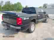 2007 Dodge Dakota SLT with VIN 1D7HW48K97S138512, listed as a IAAI auction lot 42386042 with 146,629 mi miles and . Bid and sale history available at DreamBid. Image 4.