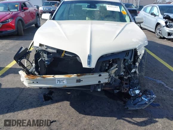 ✅ 2015 Lincoln MKS • VIN: 1LNHL9DK8FG607141 • Lot: 43612263. Listed on IAAI with 72,529 mi. Free auction sales archive from the USA and detailed vehicle history report at DreamBid. Image 6.