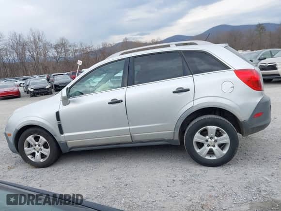 2015 Chevrolet Captiva Sport LS z VIN 3GNAL2EK7FS520108, wystawiony jako IAAI lot #41655207 z przebiegiem 201 135 mil mil oraz . Historia ofert i sprzedaży dostępna na DreamBid. Obrazek 15.