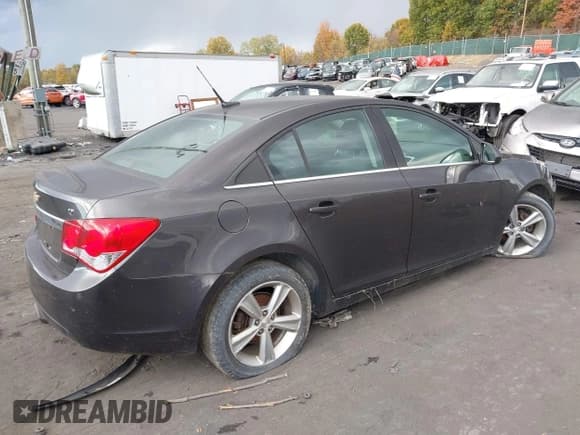 ✅ 2014 Chevrolet Cruze 2LT • VIN: 1G1PE5SB0E7422014 • Lot: 43512602. Listed on IAAI with 126,007 mi. Free auction sales archive from the USA and detailed vehicle history report at DreamBid. Image 4.