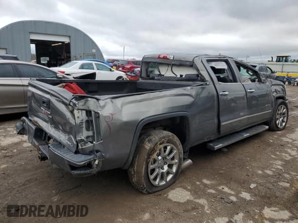 ✅ 2018 GMC Sierra 1500 Denali • VIN: 3GTU2PEC9JG256304 • Лот: 57798495. Опубликован ранее на Copart с пробегом 167 355 миль. Бесплатный доступ к архиву аукционных продаж из США и подробный отчёт об истории автомобиля на DreamBid. Изображение 3.