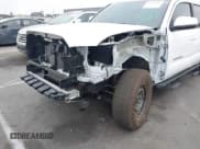 ✅ 2023 Toyota Tacoma SR5 • VIN: 3TMDZ5BN9PM169017 • Lot: 42724717. Listed on IAAI with 28,467 mi. Free auction sales archive from the USA and detailed vehicle history report at DreamBid. Image 6.