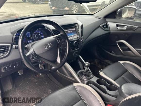 2015 Hyundai Veloster Turbo z VIN KMHTC6AE3FU228606, wystawiony jako Copart lot #48008524 z przebiegiem 103 559 mil mil oraz . Historia ofert i sprzedaży dostępna na DreamBid. Obrazek 9.