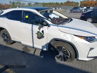 ✅ 2017 Lexus RX 450h • VIN: 2T2BGMCA2HC014141 • Lot: 43608104. Listed on IAAI with 73,276 mi. Free auction sales archive from the USA and detailed vehicle history report at DreamBid. Image 1.