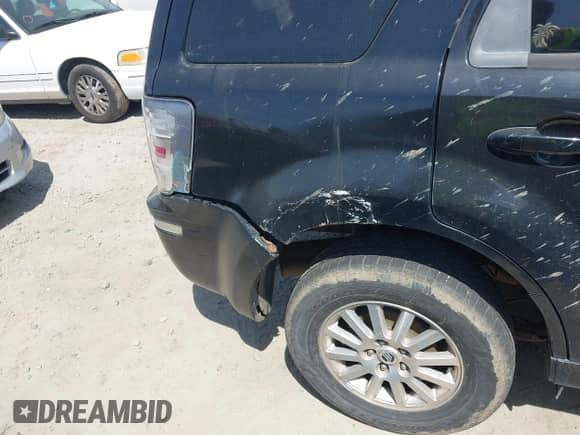 2009 Mercury Mariner Premier with VIN 4M2CU977X9KJ10414, listed as a IAAI auction lot 41880499 with 175,988 mi miles and . Bid and sale history available at DreamBid. Image 6.