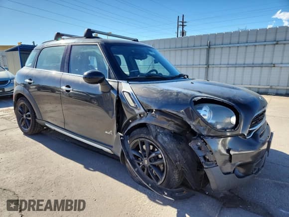 ✅ 2015 MINI Countryman S • VIN: WMWZC5C59FWP45285 • Lot: 87113735. Listed on Copart with 160,701 mi. Free auction sales archive from the USA and detailed vehicle history report at DreamBid. Image 4.