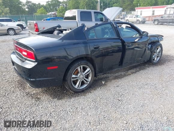 ✅ 2014 Dodge Charger RT Max • VIN: 2C3CDXDT6EH322499 • Lot: 42572184. Wystawiony na IAAI z przebiegiem 76 080 mil. Bezpłatny archiwum sprzedaży aukcyjnych z USA i szczegółowy raport historii pojazdu na DreamBid. Zdjęcie 4.