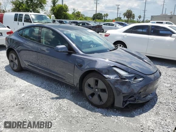 ✅ 2023 Tesla Model 3 • VIN: 5YJ3E1EA1PF407231 • Лот: 60969045. Опубликован ранее на Copart с пробегом 34 811 миль. Бесплатный доступ к архиву аукционных продаж из США и подробный отчёт об истории автомобиля на DreamBid. Изображение 4.