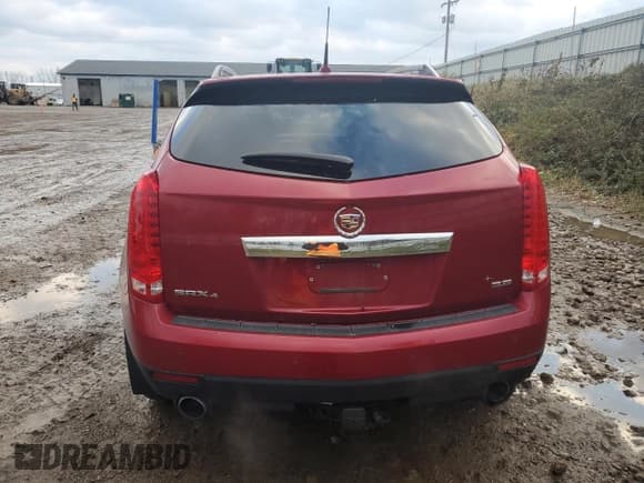 ✅ 2013 Cadillac SRX Luxury Collection • VIN: 3GYFNGE30DS645165 • Lot: 92029975. Wystawiony na Copart z przebiegiem 71 065 mil. Bezpłatny archiwum sprzedaży aukcyjnych z USA i szczegółowy raport historii pojazdu na DreamBid. Zdjęcie 6.