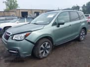 ✅ 2018 Subaru Forester Premium • VIN: JF2SJAEC4JH404549 • Lot: 42916191. Listed on IAAI with 81,904 mi. Free auction sales archive from the USA and detailed vehicle history report at DreamBid. Image 2.